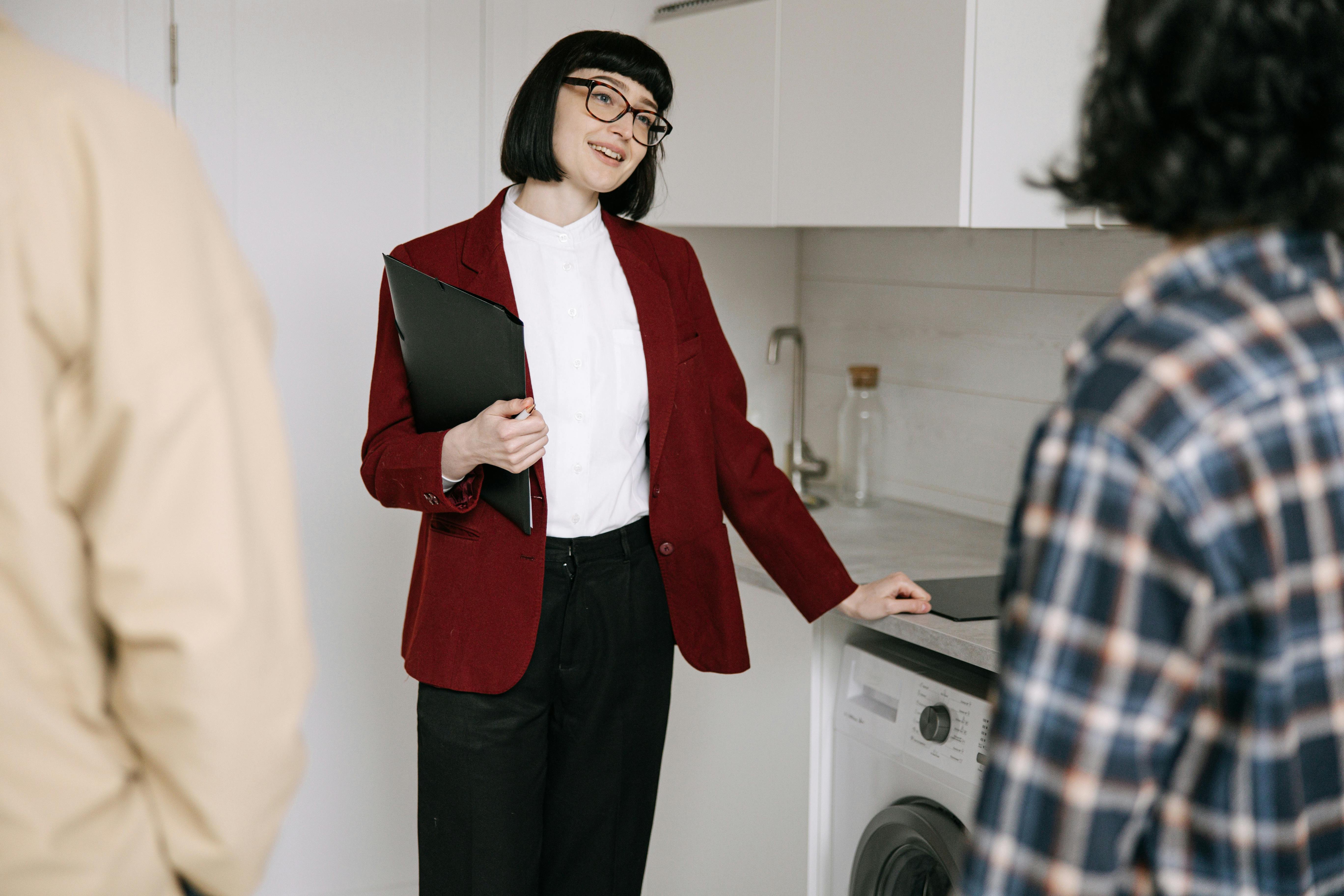Real Estate Agent Interviewing Tenants